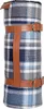A rolled-up picnic blanket with leather straps. Anteprima dell’immagine prodotto