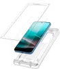 An exploded view of a smartphone screen protector installation kit, showing the phone, screen protector, and installation frame. Anteprima dell’immagine prodotto