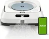 A robot vacuum cleaner is shown spraying water, with a smartphone displaying the iRobot logo next to it. Anteprima dell’immagine prodotto