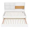 A white wooden bed frame with a built-in shelf unit and a pull-out trundle bed, shown from the front. Produktbild-Vorschau