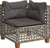 A corner sofa module with grey cushions and a woven rattan-like base, set against a white background. Produktbild-Vorschau