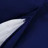A close-up view of a navy blue beanbag with a zipper partially open, revealing a white mesh interior. Produktbild-Vorschau