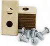 A stack of replacement blades for a robotic lawnmower and several screws are arranged on a white background. Podgląd zdjęcia produktu