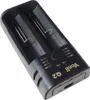 A black universal battery charger with two slots. Produktbild-Vorschau