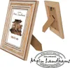 A product shot of a wooden picture frame, shown from two angles, with a logo and text overlay. Produktbild-Vorschau