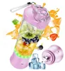 A pink portable blender filled with fruit and surrounded by splashes of juice and ice cubes. Produktbild-Vorschau