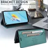 A smartphone case with a wallet and card slots is displayed on a desk next to a laptop and other office items. Produktbild-Vorschau