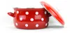 A red and white polka dot enamel pot with its lid slightly ajar, set against a white background. Anteprima dell’immagine prodotto