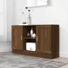 A brown wooden sideboard with two doors and a central open shelf, decorated with vases and a box. Náhľad obrázku produktu