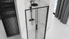 A modern bathroom with a black-framed shower enclosure. Náhled obrázku produktu