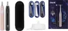 A collage of Oral-B IO2 electric toothbrush components and packaging. Produktbild-Vorschau