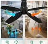 A split image showing a black ceiling fan in two different room settings, illustrating airflow direction for cooling and heating. Podgląd zdjęcia produktu