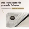 A close-up view of an orthopedic dog bed with a corduroy cover and a brand logo. Produktbild-Vorschau
