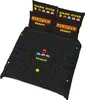 A Pac-Man themed bedding set with two pillowcases and a duvet cover, displayed on a white background. Voir les images du produit
