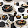 A collage of four images showcasing a black ceramic dinnerware set in various arrangements, including place settings with food and cutlery. Voir les images du produit