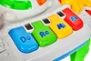 A close-up view of a colorful toy keyboard with musical notes labeled on the keys. Náhľad obrázku produktu