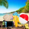 Beach scene with picnic items laid out on a wooden surface. Produktbild-Vorschau