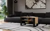 A modern living room with a dark gray sectional sofa, a coffee table, and a large abstract painting on the wall. Voir les images du produit