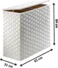 A white and gray woven laundry hamper with two compartments and a lid, shown with dimensions indicated by measurement lines and text. Podgląd zdjęcia produktu