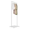 A white clothing rack with several garments hanging on it, against a white background. Náhled obrázku produktu
