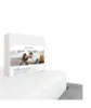 A white product box with an image of a couple on a bed sits on top of a white mattress. Podgląd zdjęcia produktu