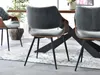 Dining chairs around a table in a dining room setting. Náhled obrázku produktu