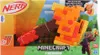 The image shows the packaging of a Nerf Minecraft Dungeons Firebrand Axe blaster. The packaging features the product, branding, and graphics related to Minecraft. Podgląd zdjęcia produktu