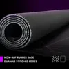 A close-up, rolled-up view of the underside of a large mousepad, highlighting its features. Anteprima dell’immagine prodotto