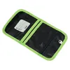 An open black wallet with green trim, showing the inside compartments. Anteprima dell’immagine prodotto
