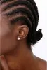 Close-up profile view of a person's ear wearing a stud earring. Produktbild-Vorschau