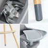 A collage of close-up shots of a baby high chair, showing details of its safety harness, leg, and tray. Anteprima dell’immagine prodotto