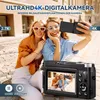 Two young women are taking a selfie with a digital camera outdoors. Produktbild-Vorschau