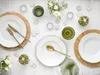A flat lay of a table setting with plates, cutlery, glasses, and floral arrangements. Náhľad obrázku produktu