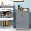 A collage of images showing a gray nightstand with various features and items on and inside it, set against a blue wall. Náhľad obrázku produktu