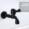 A black faucet mounted on a white wall. Produktbild-Vorschau