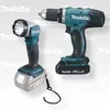 A cordless drill and a flashlight are displayed side-by-side on a light gray background. Produktbild-Vorschau