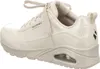 A side view of a beige Skechers sneaker. Voir les images du produit