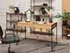 A modern home office setup with a wooden desk and black metal frame, a black office chair, and shelving units with decor. Náhled obrázku produktu
