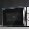 Close-up of a microwave oven door and control panel. Anteprima dell’immagine prodotto