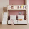 A child's loft bed with stairs and storage, featuring a sofa underneath and decorative cutouts on the railing. Náhled obrázku produktu