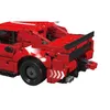 Close-up view of the rear of a red toy car model. Náhľad obrázku produktu
