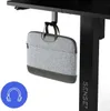 A laptop bag is hanging from a hook under a desk. Anteprima dell’immagine prodotto