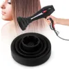 A woman's hair is being dried with a hairdryer and a diffuser attachment. A separate diffuser attachment is shown in the foreground. Voir les images du produit