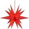 A red, 3D star-shaped lantern with small gold stars cut out of it, hanging from a thin red string against a white background. Náhled obrázku produktu