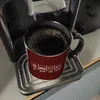 Eat, sleep, LOVE, repeat Kaffeebecher Schwarz Auf der Suche Produktbild-Vorschau 7