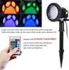 A collage of product images and descriptive text, showing garden lights in different colors, a remote control, and a close-up of a spotlight. Produktbild-Vorschau