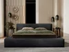 A modern bedroom with a large bed, bedside tables, and decorative wall elements. Náhľad obrázku produktu