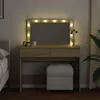 A vanity table with LED lights and a stool in a bedroom setting. Náhľad obrázku produktu