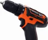 A close-up, angled view of a black and orange cordless drill against a white background. Anteprima dell’immagine prodotto
