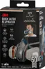 The image shows the packaging of a 3M Quick Latch Respirator with replaceable filters. The packaging displays product information, features, and an image of a person wearing the respirator. A respirator is also shown prominently in the foreground. Podgląd zdjęcia produktu